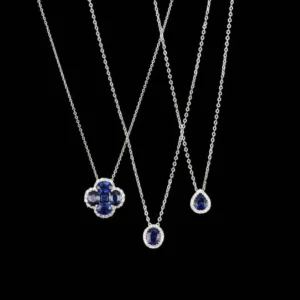 Pendentif en or blanc serti de diamants blancs et de saphir
