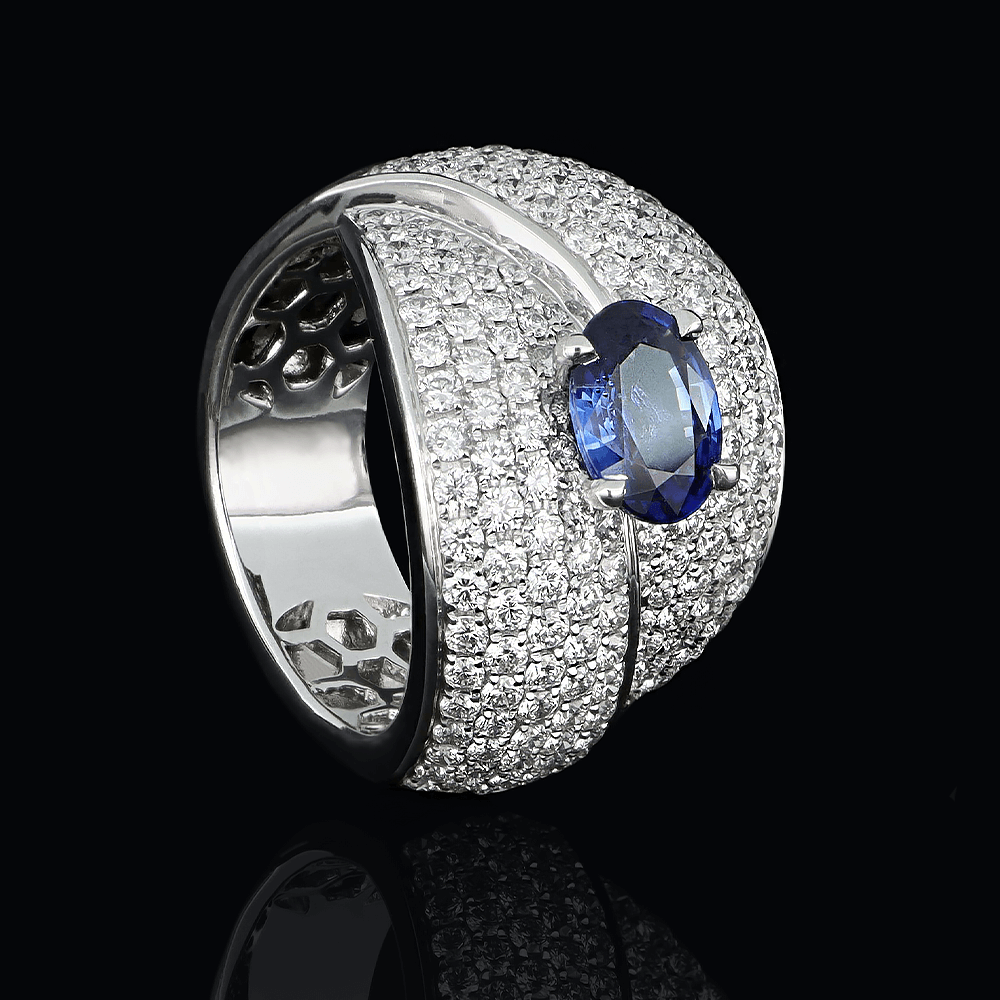 Bague boule en or blanc, diamants blancs et saphir bleu