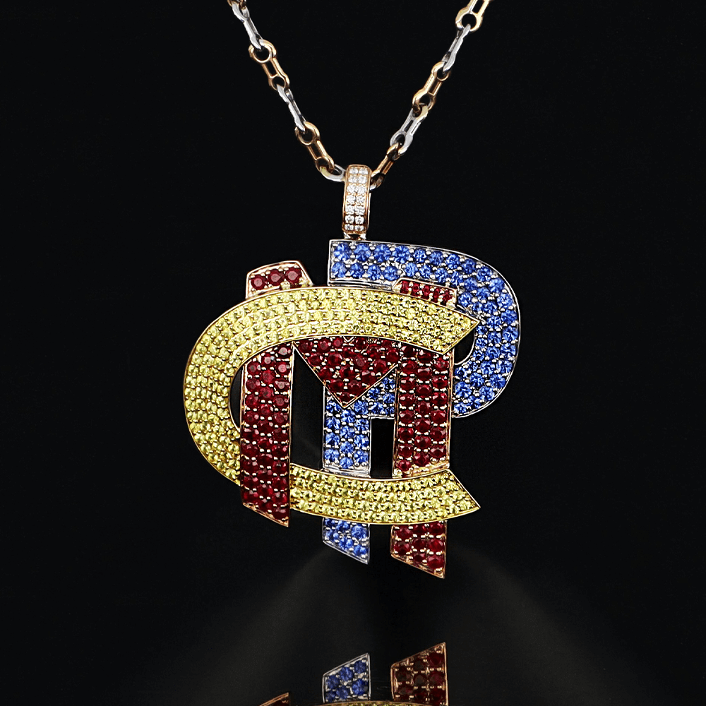 Yellow gold necklace with white diamonds, yellow diamonds, blue sapphires and rubies