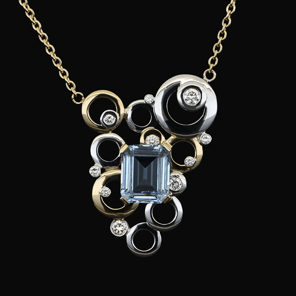 Yellow and white gold necklace with white diamonds and aquamarine