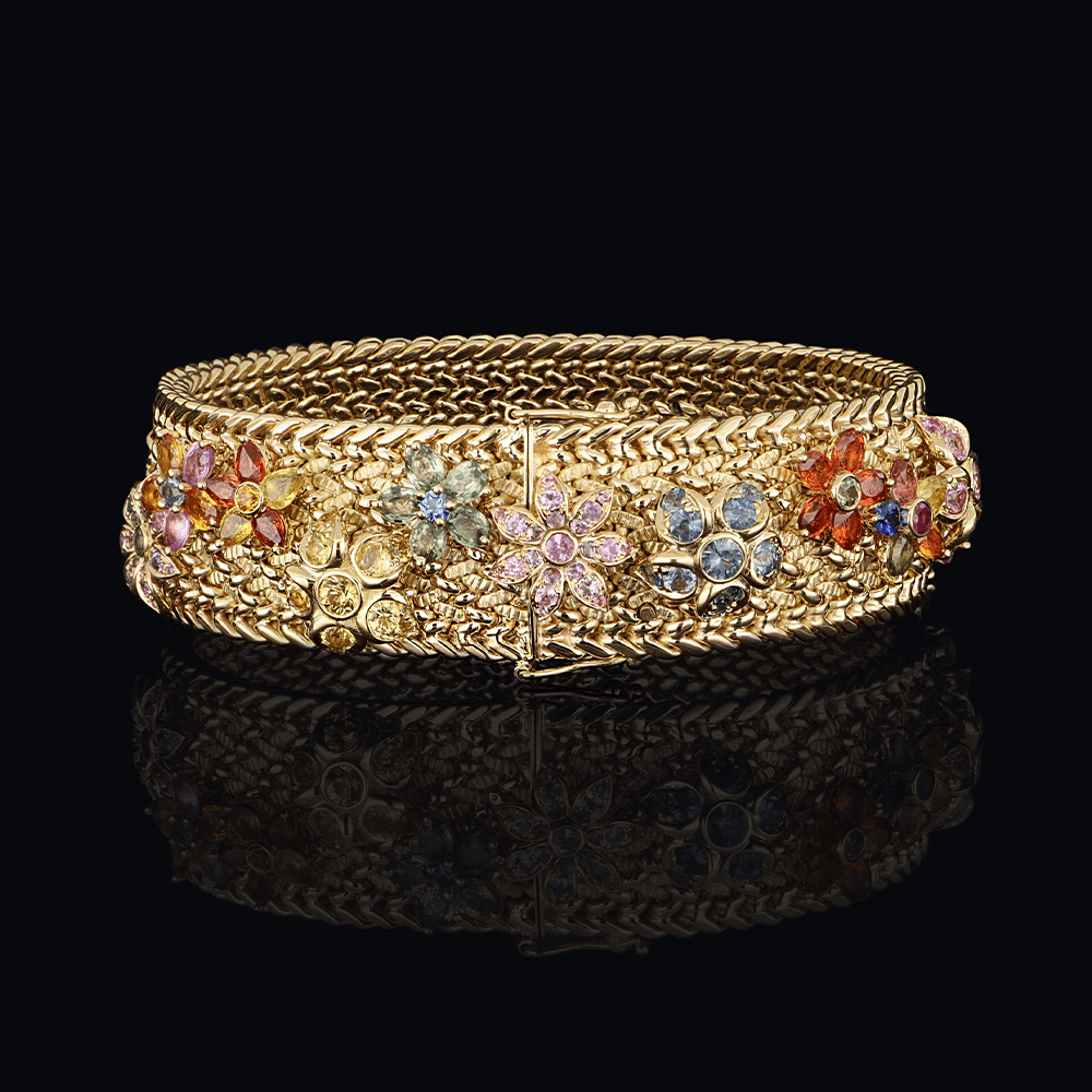 Bracelet en or jaune, fleurs serties de saphirs multicolores